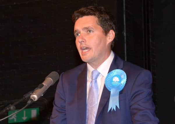 Bexhill and Battle MP Huw Merriman, pictured last year, helped organised a letter from MPs criticising the recent performance of the patient transport service