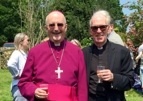 Father Christopher Channer, right, with Rt Rev Nicholas Reade