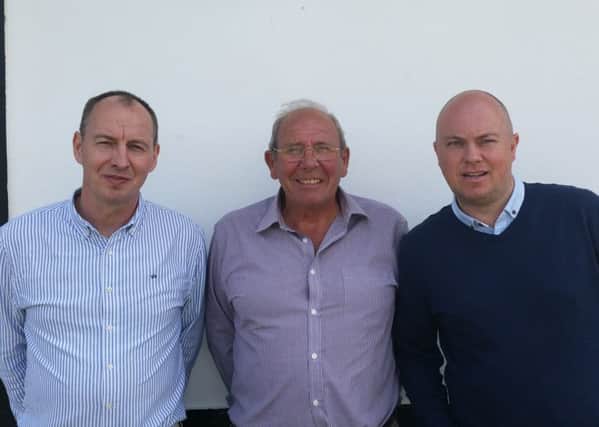 New Bexhill United Football Club joint managers Nigel Kane (left) and Ryan Light (right) with chairman Bill Harrison. Picture courtesy Mark Killy