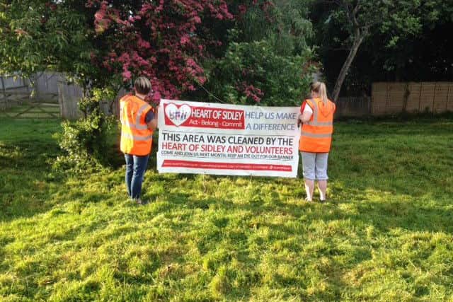 Heart of Sidley put up a banner highlighting everyone's hard work after the clean-up