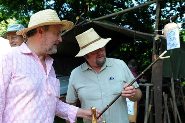 Hugh Bonnneville chattting to stick maker Paul Jenner. Pictures: Kate Shemilt ks16000734-4
