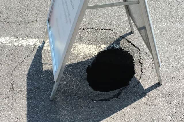 The sinkhole is considerably larger than the opening, said to be around 10ft deep