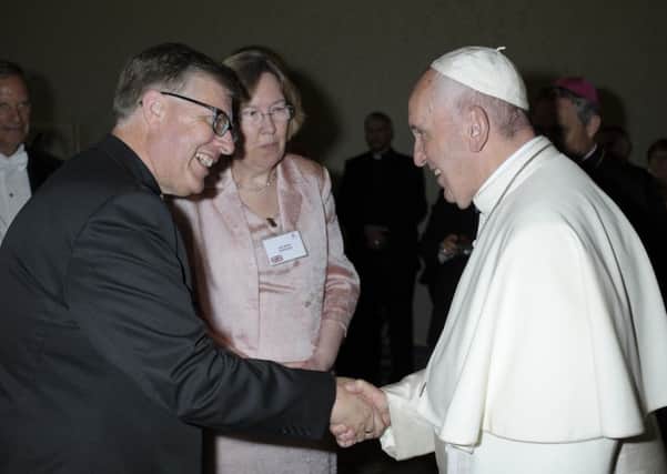 Worthing Deacon Mark Woods and his wife Jane, from St Michaels Church in High Salvington, meet Pope Francis.