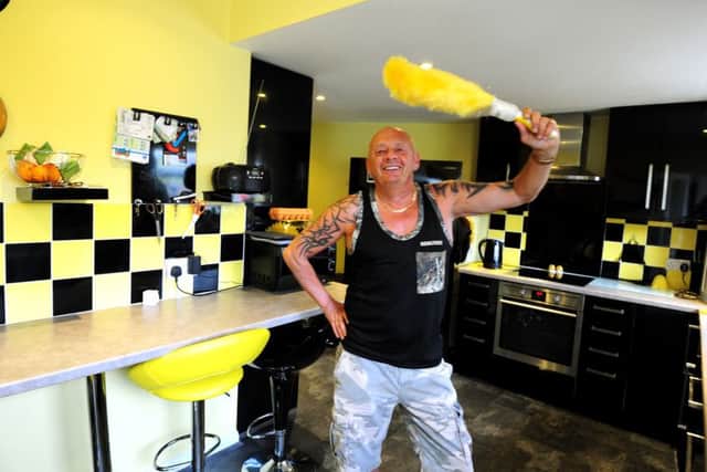 Roger Young in his vibrant kitchen. Picture: Kate Shemilt