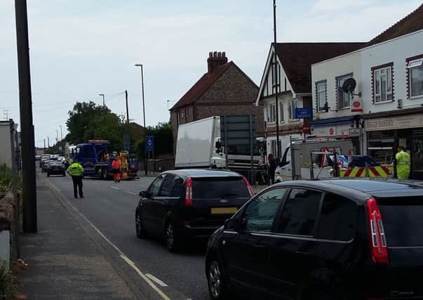 West Sussex Highways and police were at the scene to help rescue the lorry