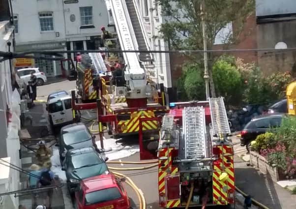 Fire engines on Norman Road tackling a cooker blaze. Photo by Paul Ashton