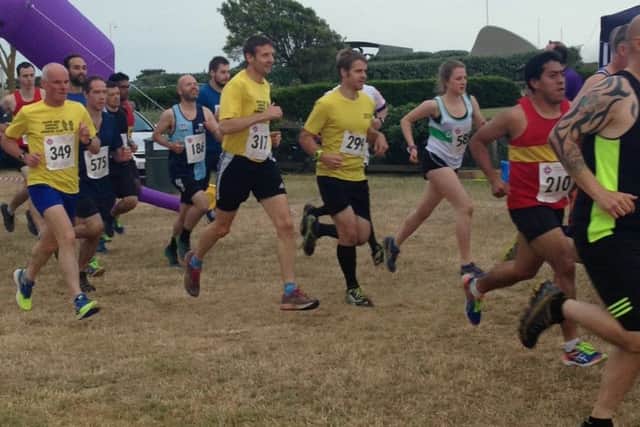 Runners taking part in Arunners five-mile Beach Run