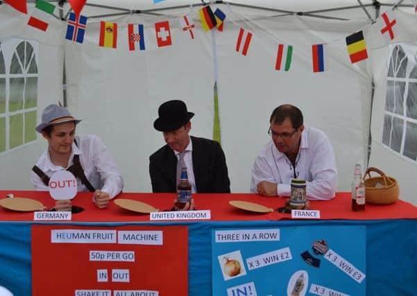 The Brexit human fruit machine, challenging punters to win yes votes. Picture: Stephen Berendt