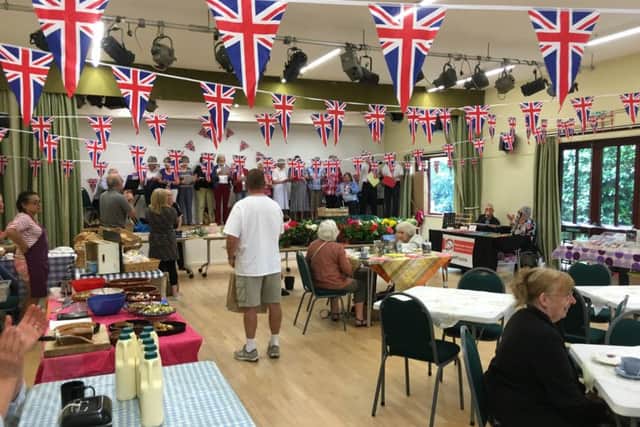 The farmers' market was specially decorated to celebrate its 16th birthday and amateur choir Vocalality performed