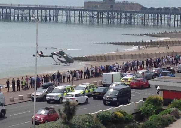 The Kent, Surrey and Sussex Air Ambulance took the woman to hospital. Photo by Brian Pick