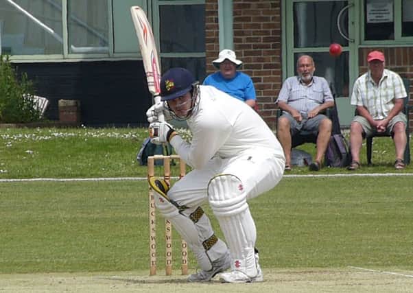 Tom Gillespie ducks under a short delivery on his way to a century for Hastings Priory against Billingshurst. Picture by Simon Newstead (SUS-161106-231747002)
