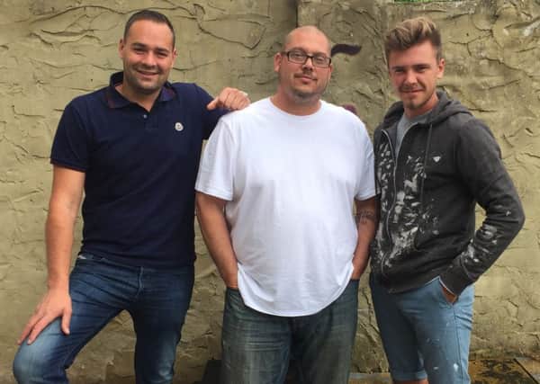 Shane Smith, centre, wrote charity single England Loopy and his workmates Oran Guile, left, and Tony Troncone are featured on the song