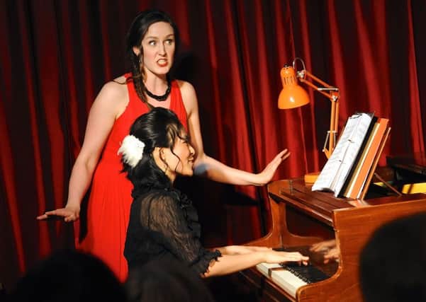 Jessica Zhu and guest singer Marion Wyllie perform Leonard Bernstein's America as an encore. Picture: Stephen Goodger