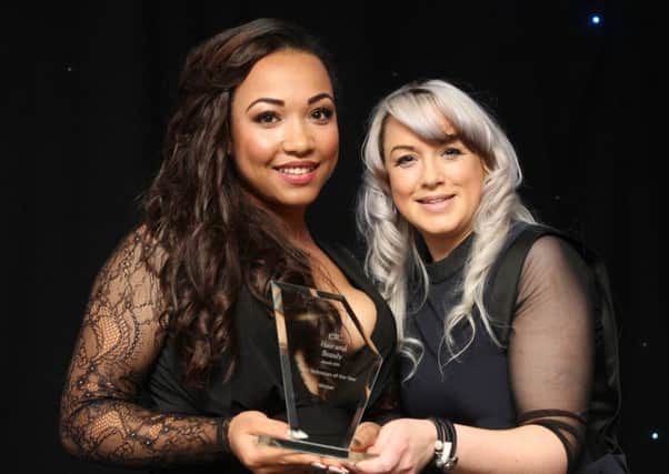 DM15222487a.jpg etc Hair and Beauty Awards 2015. Host Gina Akers presents the award for Nail Technician of the Year to Jasmine McPherson. Photo by Derek Martin SUS-151019-085058008