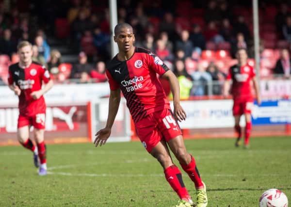 Lewis Young makes a pass for Crawley Town against Exeter City, 28th March 2016. (c) Jack Beard SUS-160328-171235008