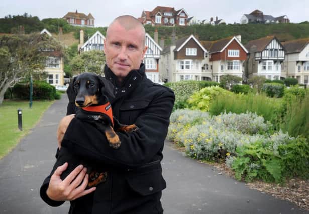 Michael Sheridan and dog Zac in Grosvenor Gardens, St Leonards, where his puppy has been 'traumatised' by other dogs not on leads