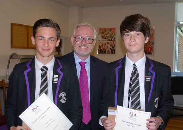 Shoreham College pupils gained national recognition in the ISA Annual Essay writing competition. William Orams, headmaster Richard Taylor-West and Joshua Firsht.