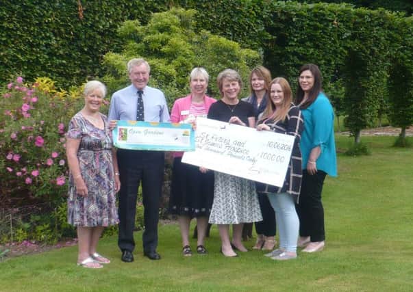 Maureen and Andrew Winskill (owners of Orchard House, Cuckfield) with members of staff from St Peter & St James Hospice and Lloyds Banking Group