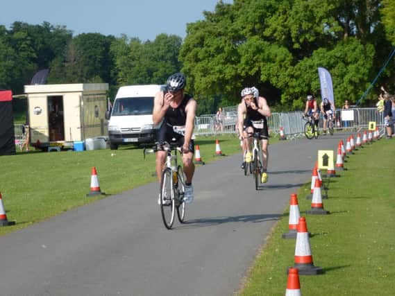 Competitors set off on the bike leg in a previous staging of the Sussex Triathlon at Ashburnham Place