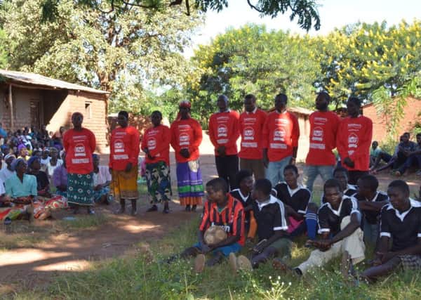 The Sport Relief shirts were received with great excitement in Gunde, a village in central Malawi SUS-160617-122422003