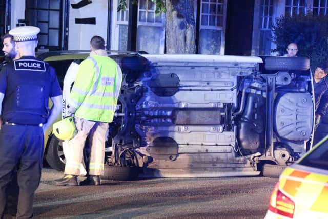 A car overturned in Pavilion Road, Worthing in the early hours of this morning. Picture: Eddie Mitchell