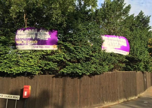 Someone attempted to paint over Bernard Rayner's Vote Leave posters