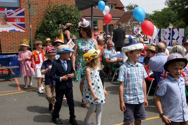 Hats off to pupils at Little Horsted Primary School as they celebrate the Queen's 90th birthday - Picture by Ron Hill