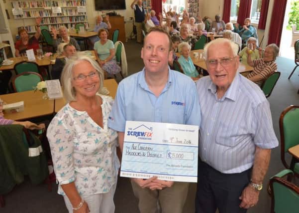 Age Concern Hassocks & Disctrict receiving the donation from Screwfix