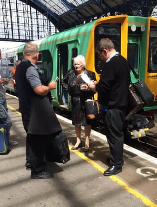 The driver and guard at Brighton station on Wednesday (Picture: Cliff Heys-Limonard) SUS-160617-162318001