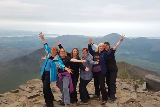 Slimming World members from the Southgate, Crawley group, climb Mount Snowdon raising more than Â£2,250 for Crae International - picture submitted