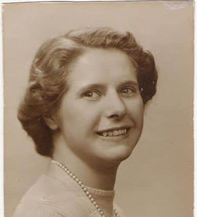 Joan Woodhouse was a demure, deeply religious librarian