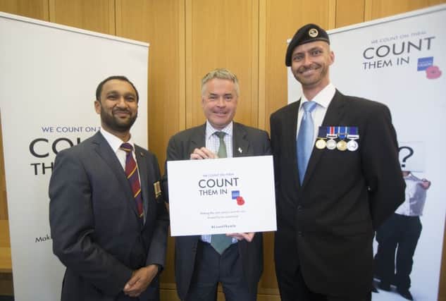 Tim Loughton, MP for East Worthing and Shoreham, supporting Royal British Legion's 'Count Them In' campaign (photo submitted). SUS-160620-163848001