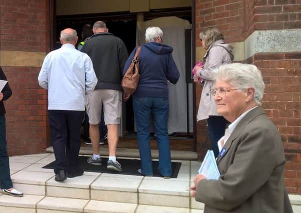 Two women were seen handing out Stronger In leaflets outside St John's Church. Photo by Nicola Burton
