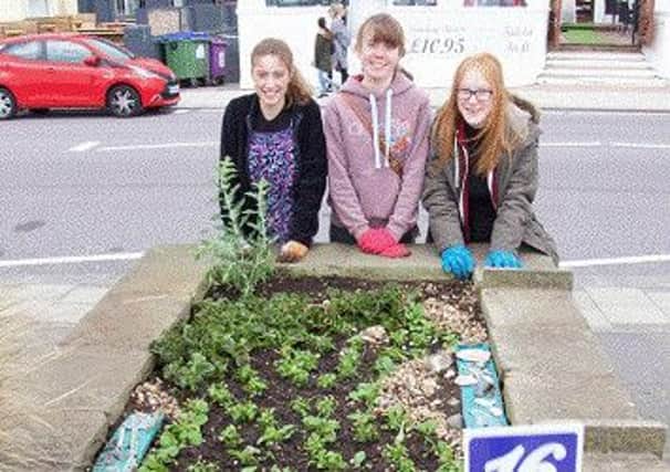 Durrington High Rotary Interact Club members (from right to left) Carolyn Acevedo, Zoe Topping and Rebecca Harris