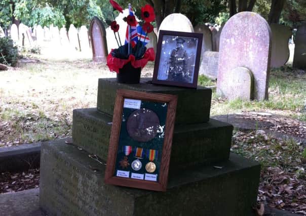 The grave of Henry Budd at Broadwater and Worthing Cemetery. Henry died at the Battle of the Somme. The Friends of Broadwater and Worthing Cemetery have a photo of him in uniform together with the death penny that was sent to his mother and his medals which a Friend, John Stepney, has kindly framed to protect and display them.