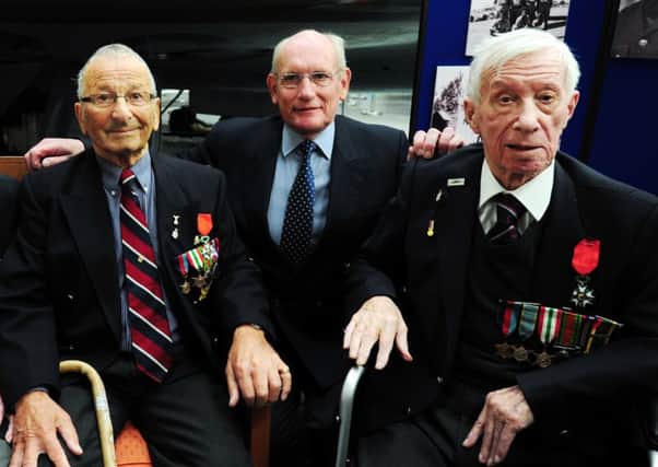 (Left to right) Stanley David, Captain FranÃ§ois Jean and Derek Wood