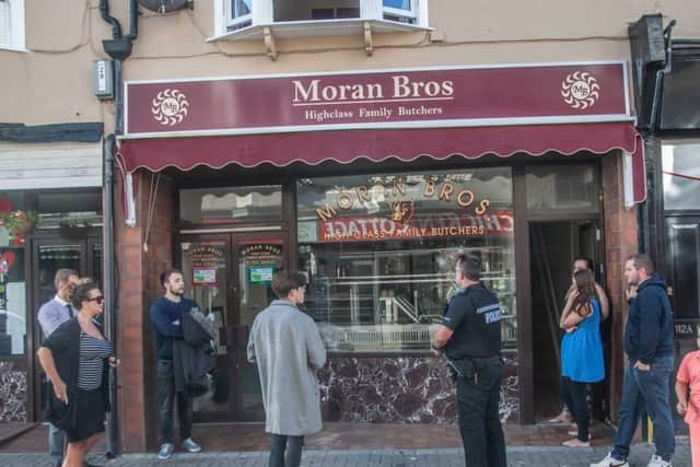 The window of Moran Bros. in Montague Street, Worthing has been smashed. Picture: Peter Pollack  www.filmonfilm.uk