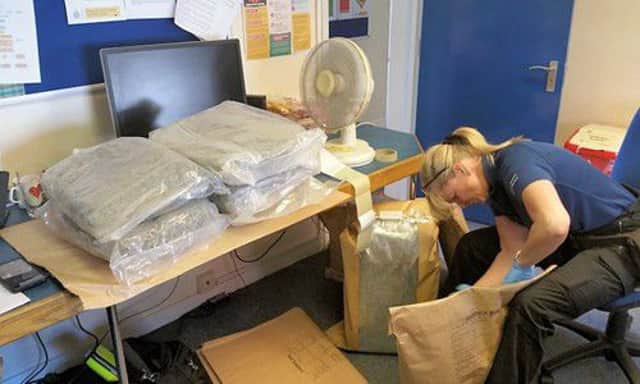 Cannabis with an initial estimated value of Â£235,000 was found in a storage container at Rye Harbour. Picture by Sussex Police. SUS-160623-121830001