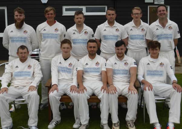 Rye Cricket Club's first team lines up for the camera prior to its victory at home to Southwater on Saturday (SUS-160619-004204002)