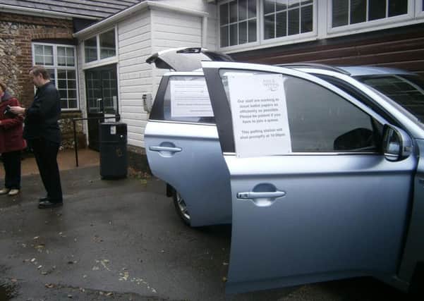 A car was used as a makeshift polling station in Sompting. Picture by Adam Hodson SUS-160624-070951001