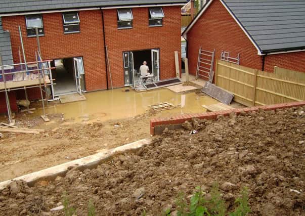 Flooding by the new houses being built