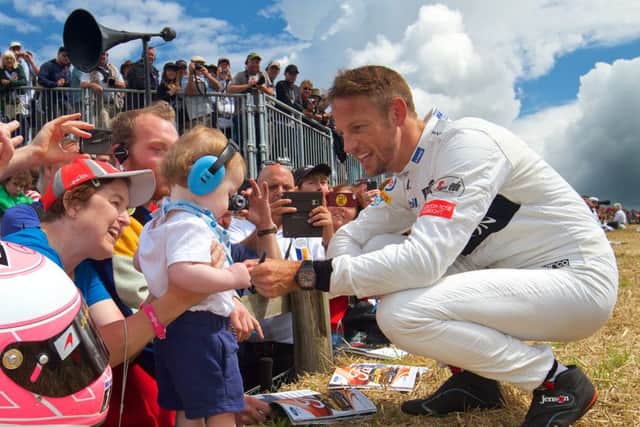 The famous event attracts thousands of people from all over the country, including motor racers like Jenson Button. Michael John Reed/REEDIMAGE