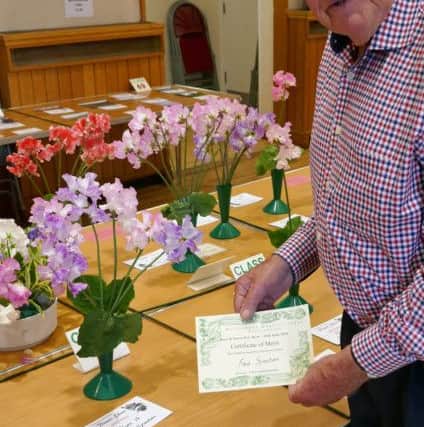 Fred Spanton won best exhibit in classes for growers of less than 50 sweet pea plants
