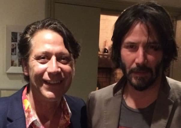 Keanu Reeves with Giles Thompson, pub owner and chef at the Earl of March, Lavant. Picture taken from Twitter.