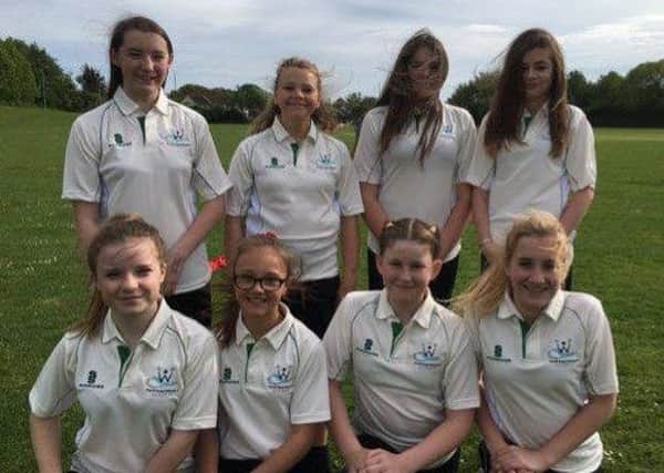 The Sir Robert Woodard Academy under-13 girls cricket team in their new kit