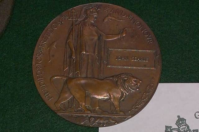 The memorial plaque of Private John Searle, who died in the Battle of the Boar's Head on June 30, 1916