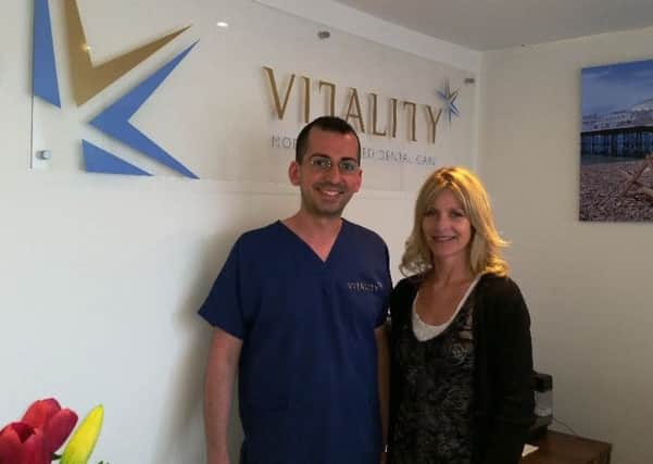 Winner Kate Clark with Arvin Mirzadeh, practice principal at Vitality