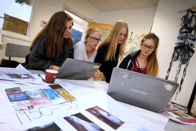 Award-winning designer Ele Slade working with students at Rye Studio School. Picture shows a few of the students at work. SUS-160627-152143001
