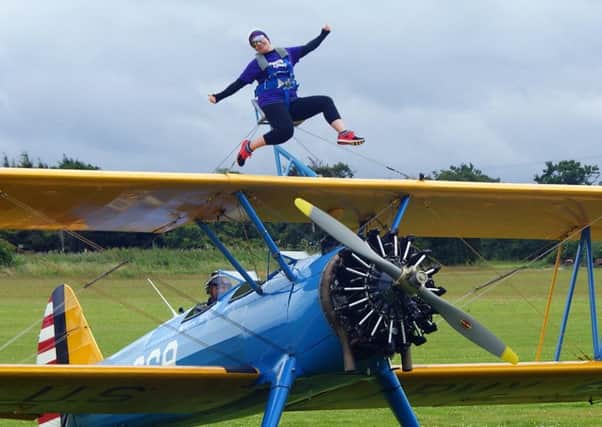 Crawley resident, Monika Skrzypczak, completed a Wingwalk on Sunday, 10 July to raise funds for Lingfield charity Young Epilepsy - picture submitted