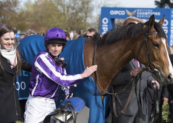 Minding with jockey Ryan Moore after winning the 1000 Guineas at Newmarket / Picture by Mark Westley